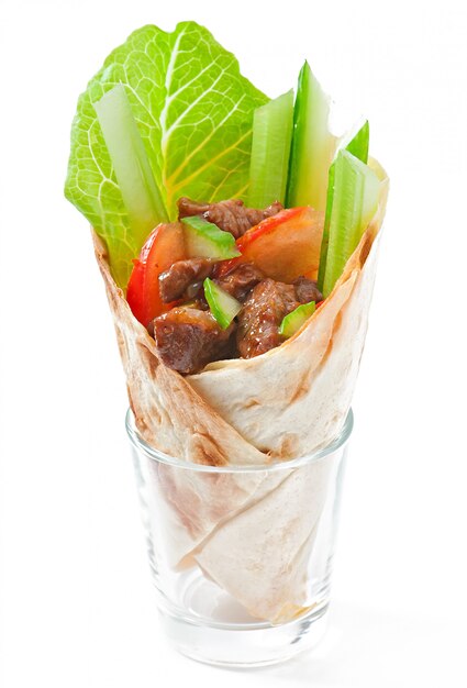 Tortilla wraps with meat and fresh vegetables