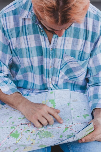 tourist checking map