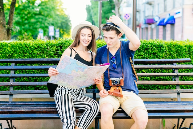 Tourist couple on bench