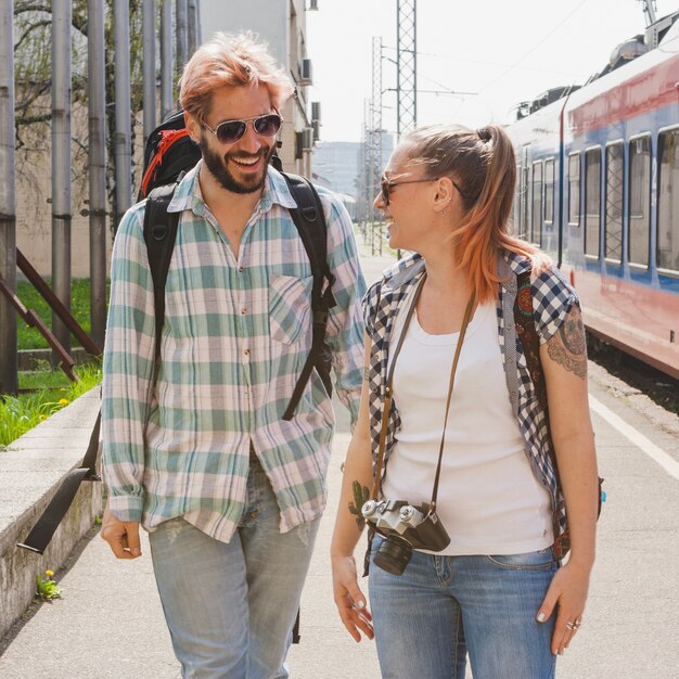 Tourist couple at train station