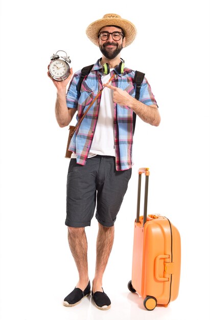 Tourist holding vintage clock