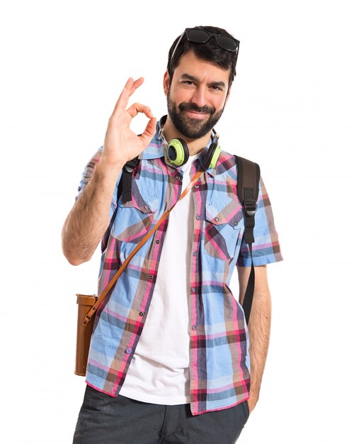 Tourist making Ok sign