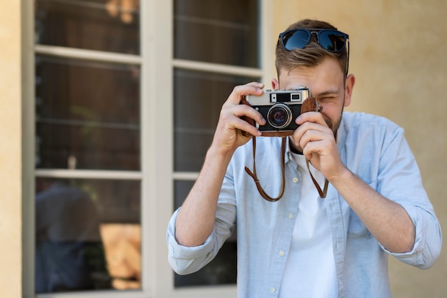 Tourist man taking a picture