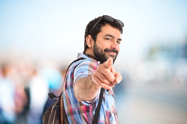 Tourist pointing front