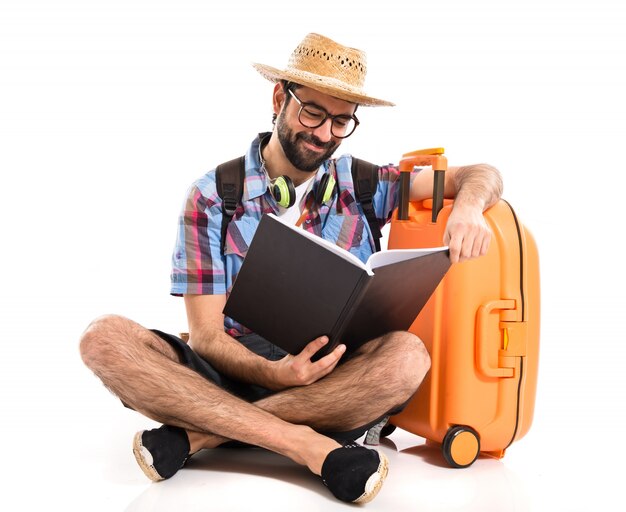 Tourist reading book