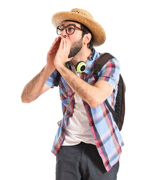 Tourist shouting over white background