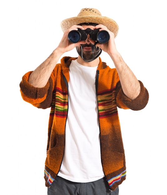 Tourist with binoculars over white background