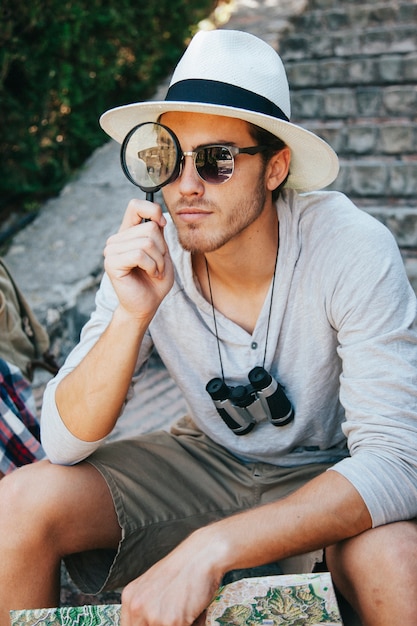 Tourist with loupe