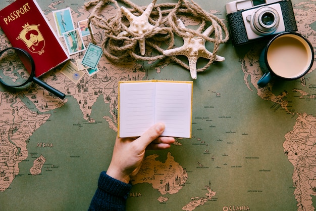 Tourist with small empty notepad