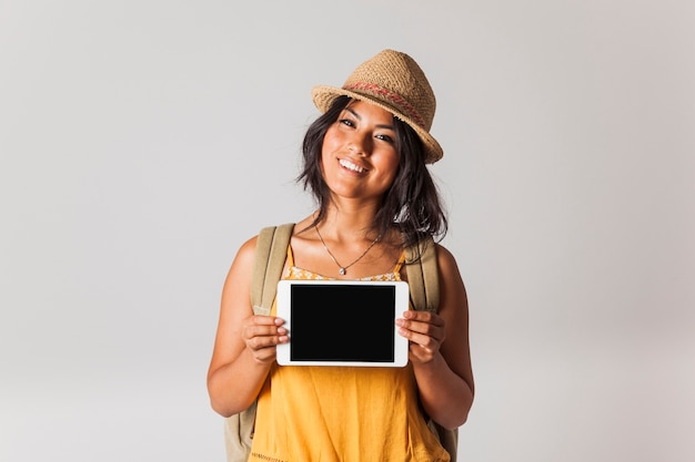 Tourist woman holding tablet