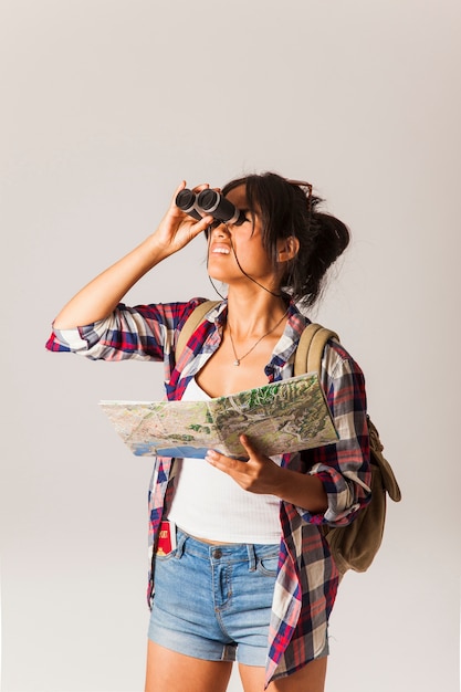 Tourist woman with binoculars