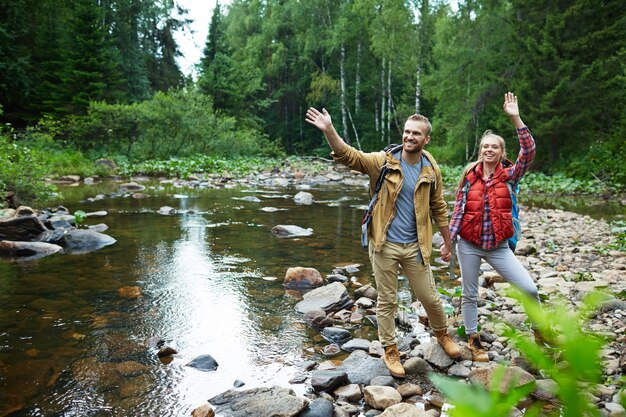 Tourists by river