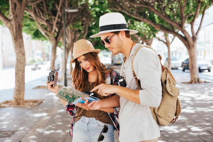 Free Photo tourists in the city with a map