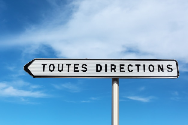 toutes directions on blue sky
