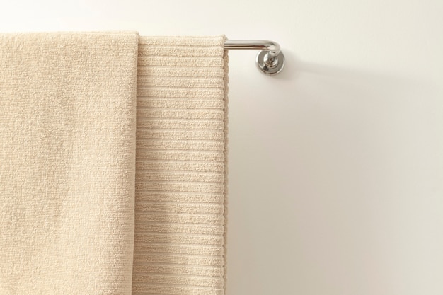 Towel hanging in bathroom, home textile