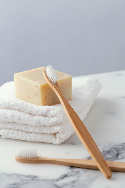 Towels with toothbrush and soap