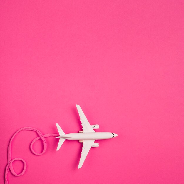 Toy plane with pink lace