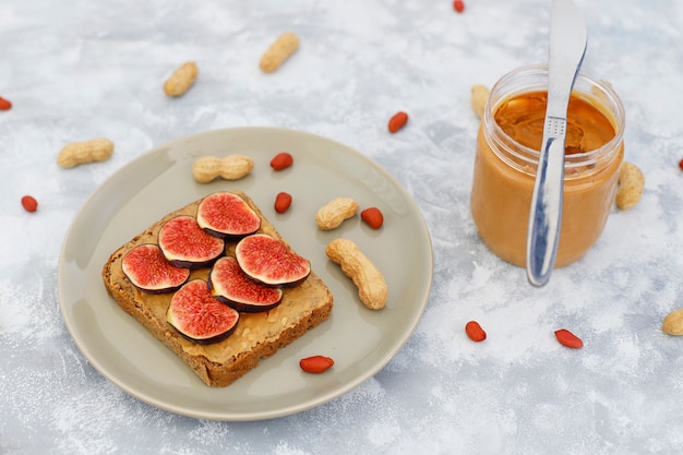 Traditional American and European summer breakfast: sandwiches of toast with peanut butter.