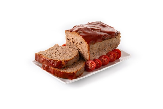 Traditional American meatloaf with ketcup isolated on white background