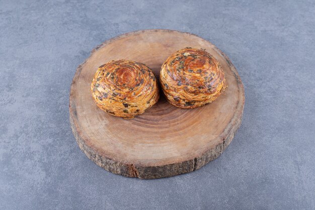 Traditional Azerbaijani cookie sweet gogals on a board , on the marble.