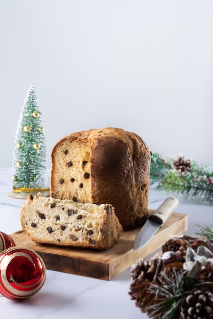 Free photo traditional christmas panettone on marble backgroundxa