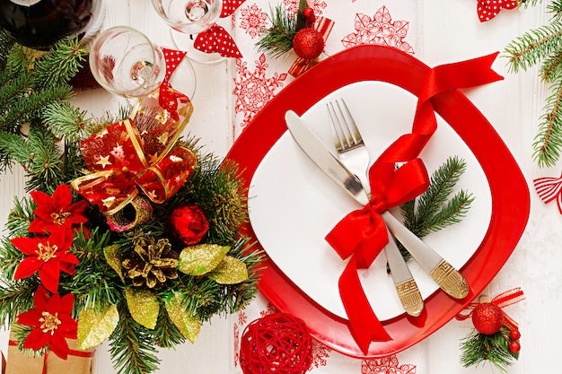 Traditional dishware on Christmas table. Flat lay. Top view