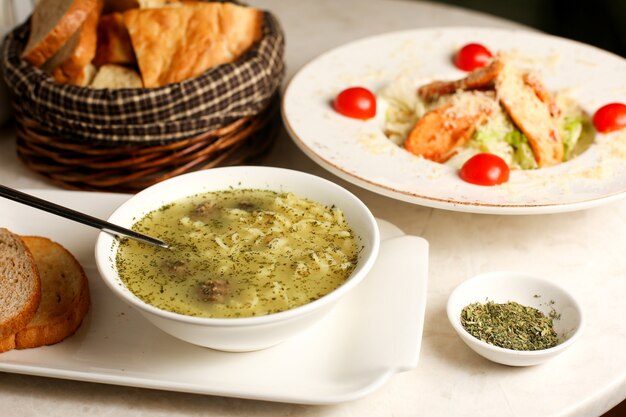 traditional dushbara and caesar salad