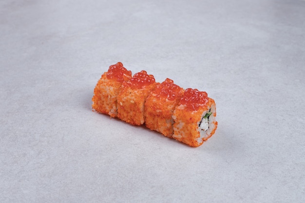 Traditional fresh sushi rolls on white background.