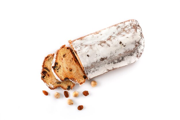 Traditional German Christmas stollen isolated on white background