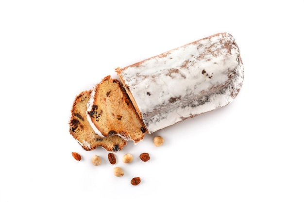 Traditional German Christmas stollen isolated on white background