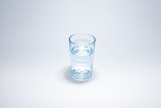 Traditional glass cup over white surface