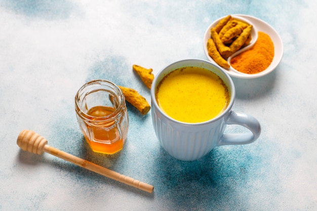 Free photo traditional indian drink turmeric golden milk.