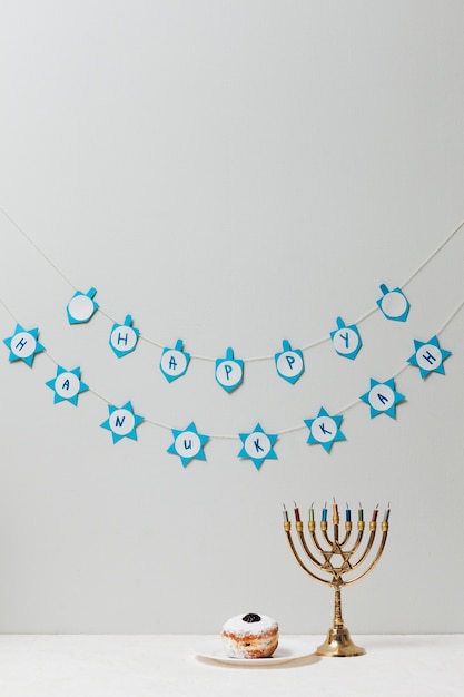 Free photo traditional jewish menorah on a table