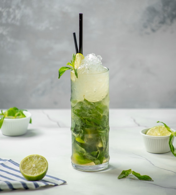 traditional mojito with ice and mint on the table
