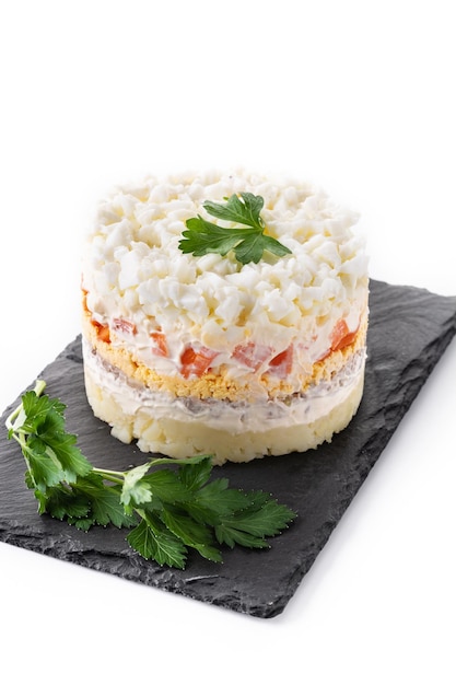 Traditional Russian layered salad Mimosa