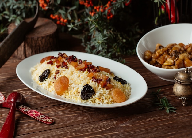 Traditional shah plov with dry fruits and nuts.