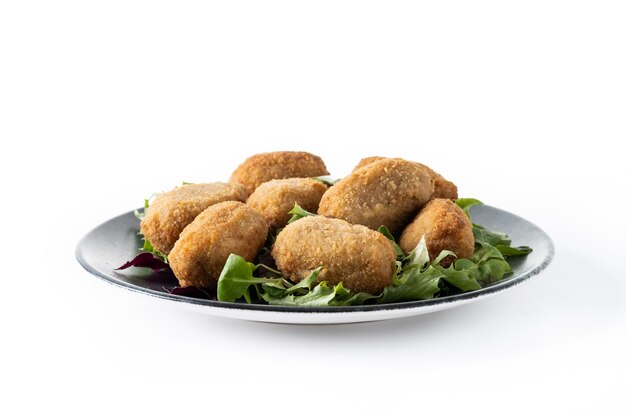 Traditional spanish fried croquettes isolated on white background