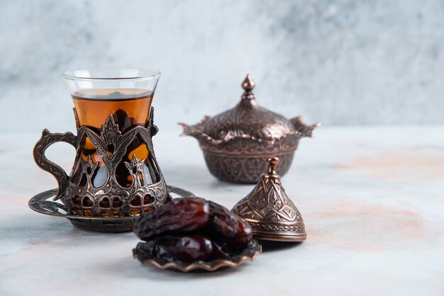 Traditional tea table on grey surface