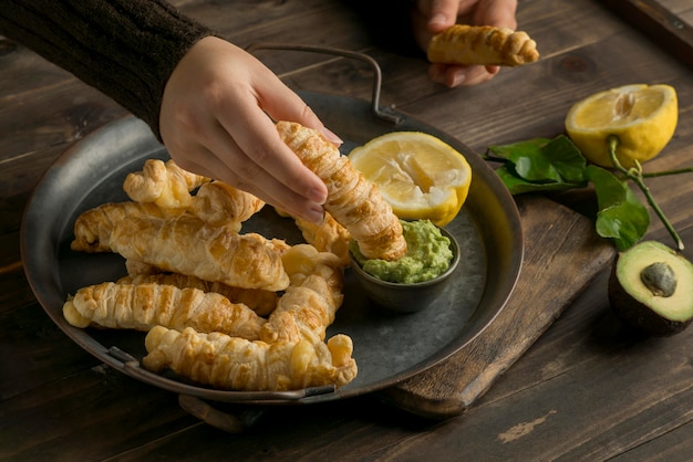 Free photo traditional tequenos with cheese assortment