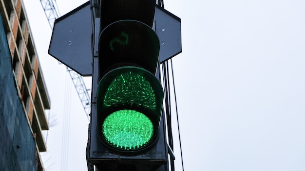 Free photo traffic lights with glowing green
