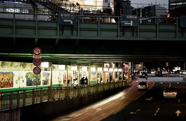 Traffic at night in the city with people