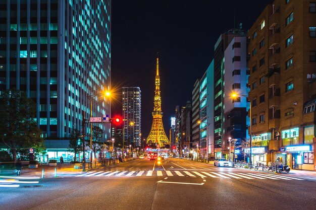 Traffic and Tokyo Tower at night, in Tokyo, Japan.