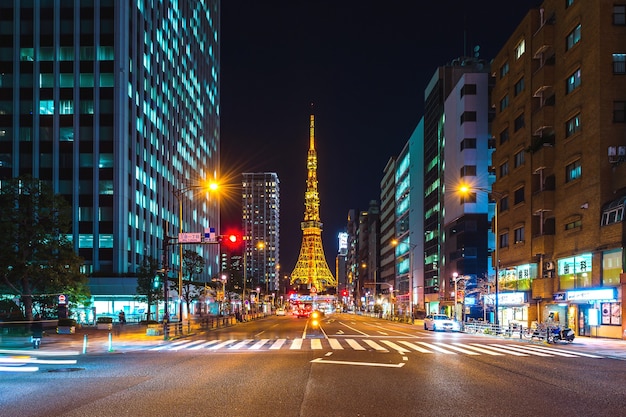 Traffic and Tokyo Tower at night, in Tokyo, Japan.