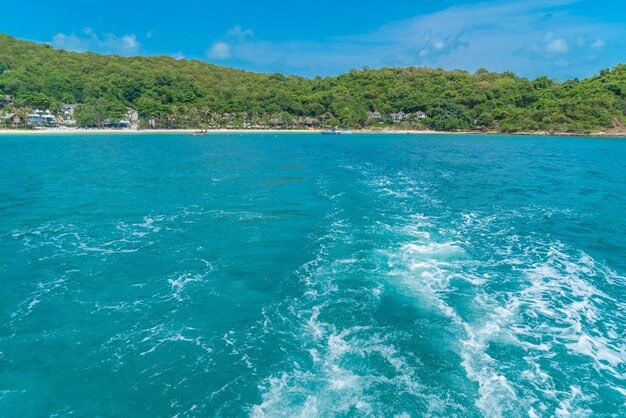 Trail on sea water surface behind boat