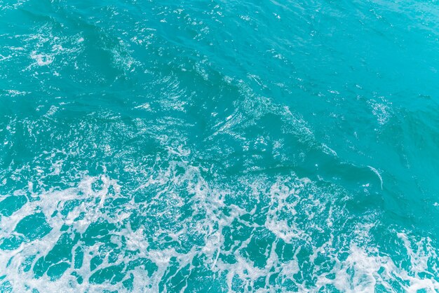 Trail on sea water surface behind boat