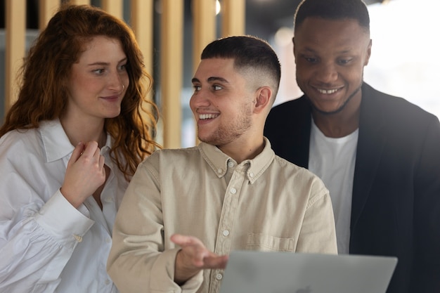 Free photo trans man at work with laptop