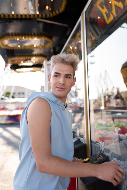 Transgender at amusement park medium shot