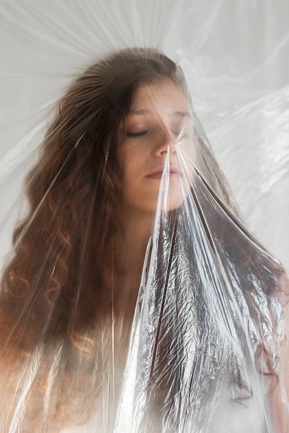 Free photo translucent and blurred portrait of woman