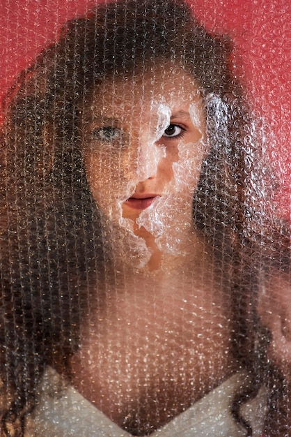 Free photo translucent and blurred portrait of woman