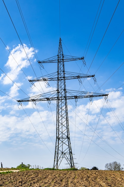 Transmission tower with a clear blue sky